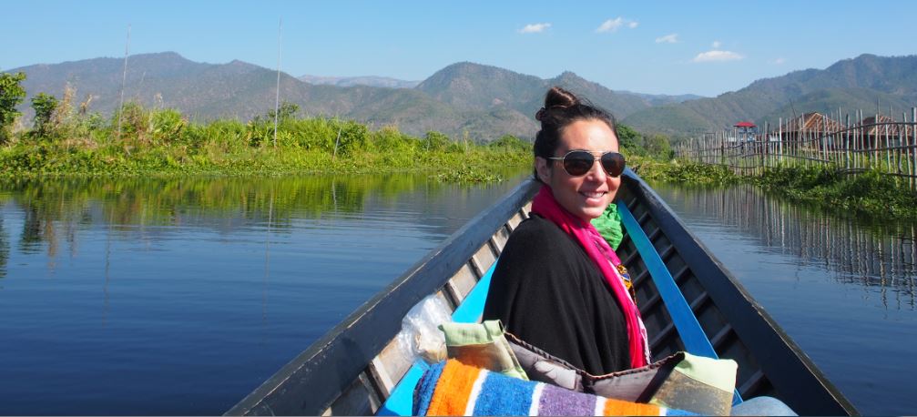 Deirdre is pictured on a boat in Imle Lake, navigating between the houses on stilts.